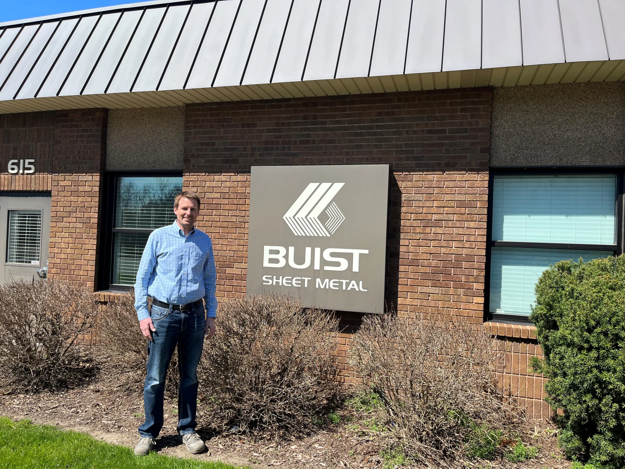 Don Buist in front of his family owned business, Buist Sheet Metal, April 2024.